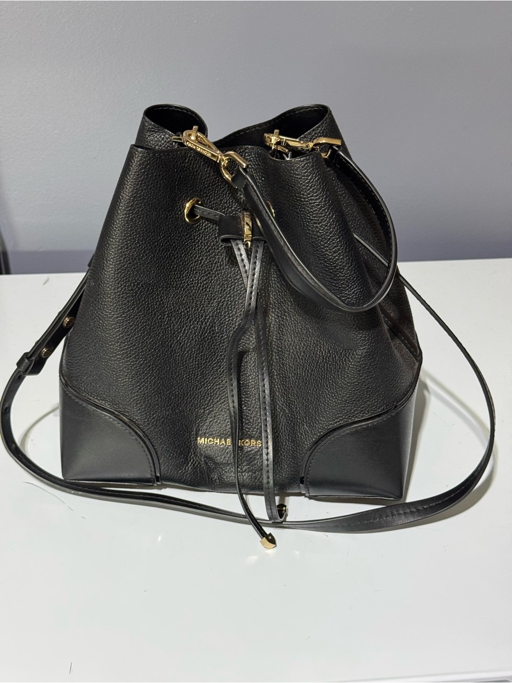 MICHAEL KORS Black Leather Drawstring Bucket Shoulder Bag with Gold Hardware